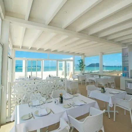 Boutique Tao Caleta Mar Коральео