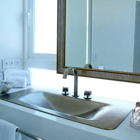 Boutique Tao Caleta Mar Коральео